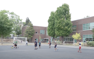 Hough Elementary students playig on the new futsal court